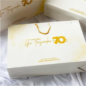 Best high top quality customized branded fashionable retractable luxury paper bag souvenir gift items wedding stationeries bag design and printing in Lagos, Abuja, Nigeria, Africa.