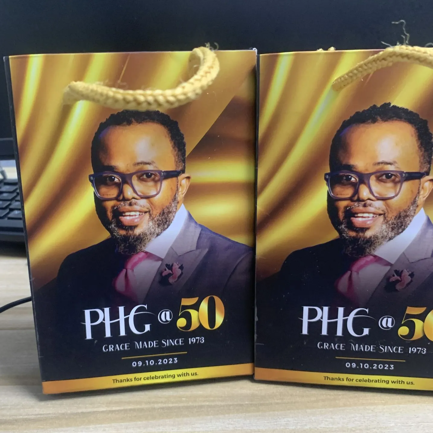 Best high top quality customized branded custom retractable fashionable 50 years birthday shopping paper bag design and printing in Lagos,
                                                        Abuja, Nigeria, Africa.