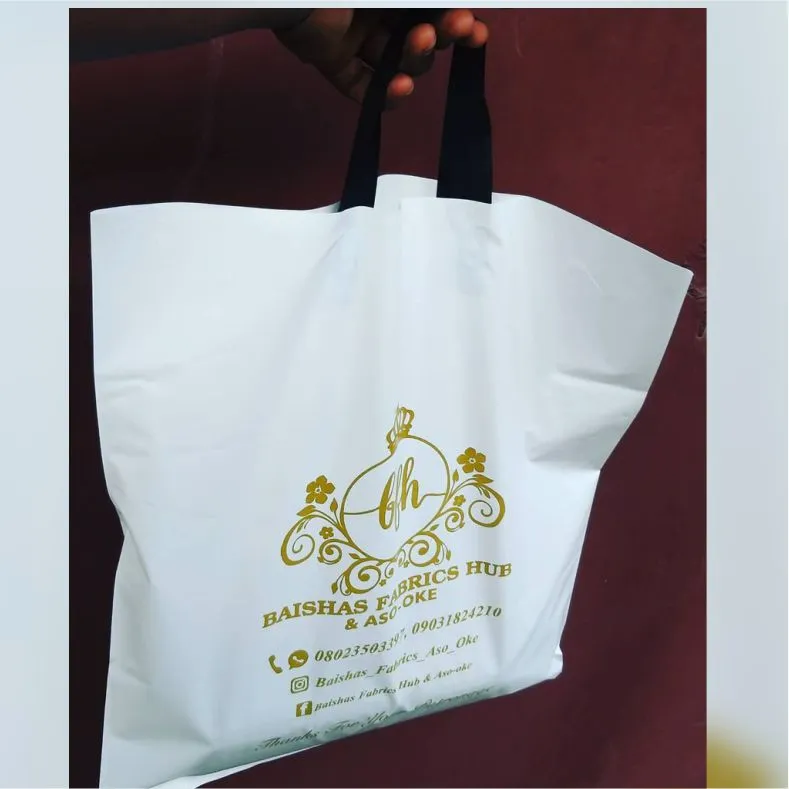 Best high top quality customized branded fashionable retractable promotional company luxury fancy loop handle nylon bag design and printing in Lagos, Abuja, Nigeria, Africa.