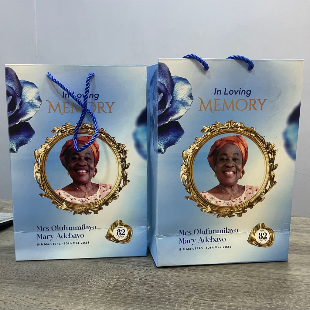 Customized high best quality top branded custom retractable funeral/burial event souvenir paper bag design and printing in Lagos, Abuja, Nigeria, Africa.