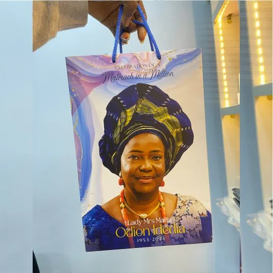 Best high top quality customized branded retractable fashionable funeral/burial paper bag design and printing in Lagos, Abuja, Nigeria, Africa.
