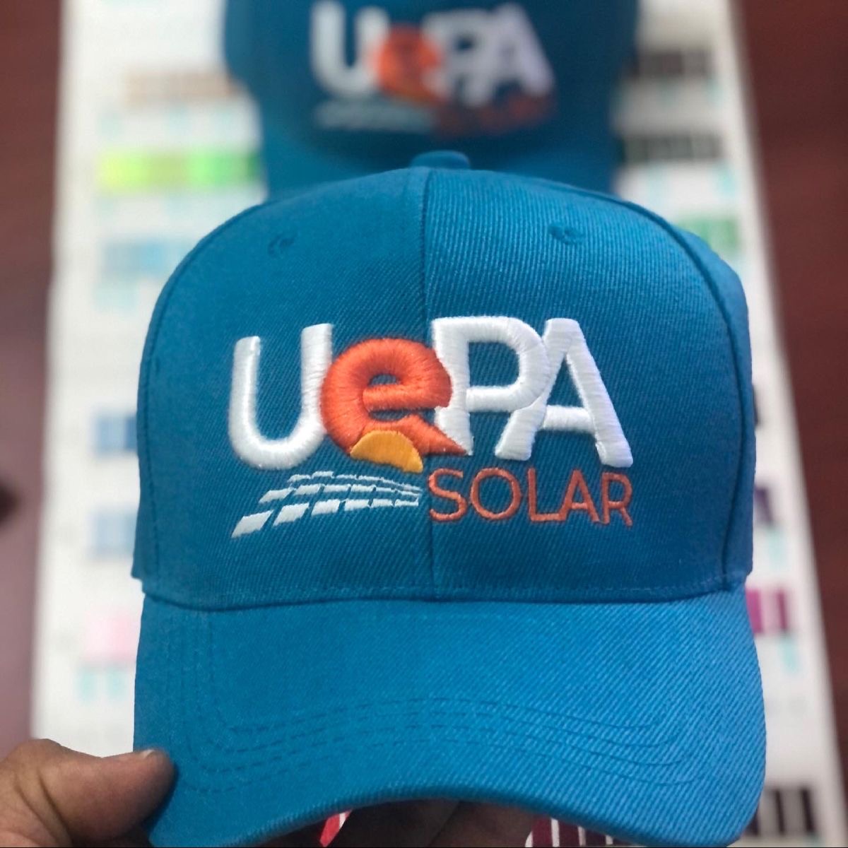 Customized high best quality top branded custom retractable 3d monogram embroidery face cap design and printing in Lagos, Abuja, Nigeria, Africa.