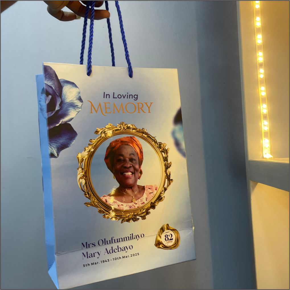 Best high top quality customized branded fashionable funeral/burial event souvenir paper bag banner design and printing in Lagos, Abuja, Nigeria, Africa.