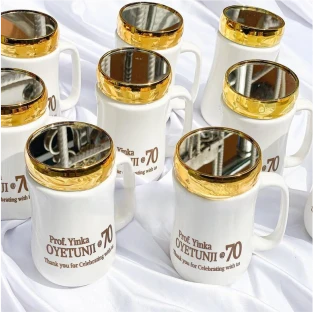 High best top quality customized branded custom premium retractable corporate birthday event party mirror lid mug souvenir gift item design and printing
                                                        in Lagos, Abuja, Nigeria, Africa.
