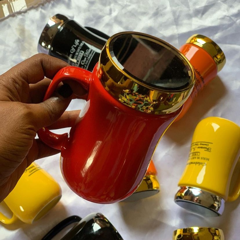 Best high top quality customized branded ceramic mirror lid mug design and printing in Lagos,
                                                            Abuja, Nigeria, Africa.