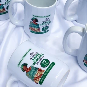 Customized high best quality top branded custom retractable promotional luxury corporate funeral/burial coated mug souvenir gift item design and printing in Lagos, Abuja, Nigeria, Africa.