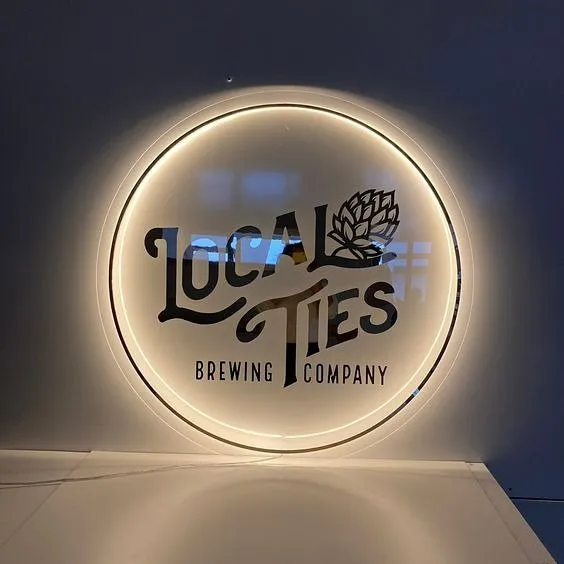 Customized branded best high top quality custom neon logo acrylic circle backlit logo signage design and printing in Lagos, Abuja, Nigeria, Africa.